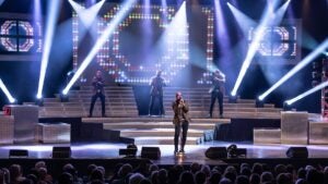 performers on a stage for SIX Branson